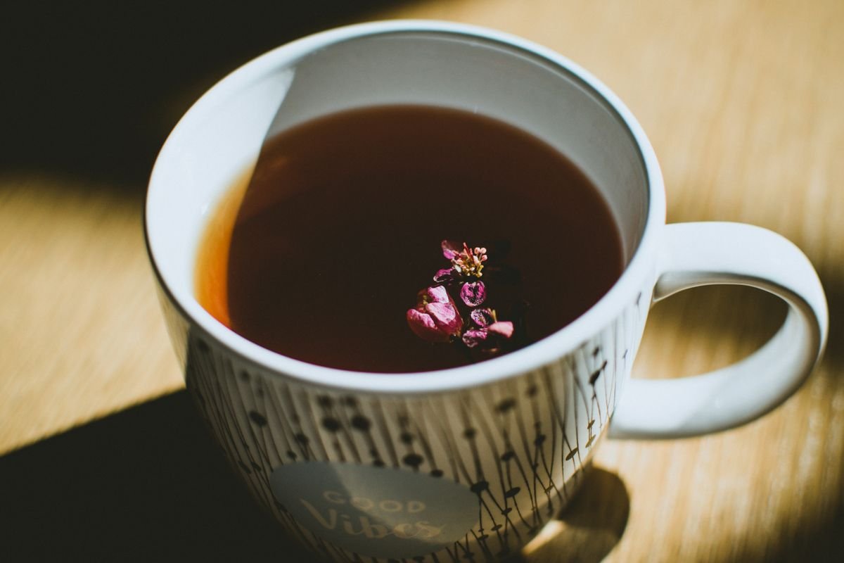 Steaming mug of herbal tea, a calming evening ritual drink