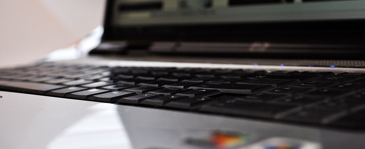 Close up of laptop keyboard while writing a salary negotiation email