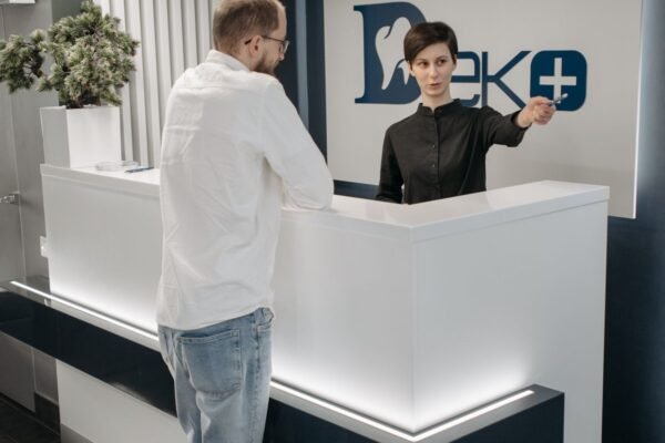 Dental clinic reception desk where staff manage patient appointments