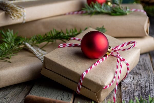 Wrapped Christmas gifts with festive ribbons and decorations