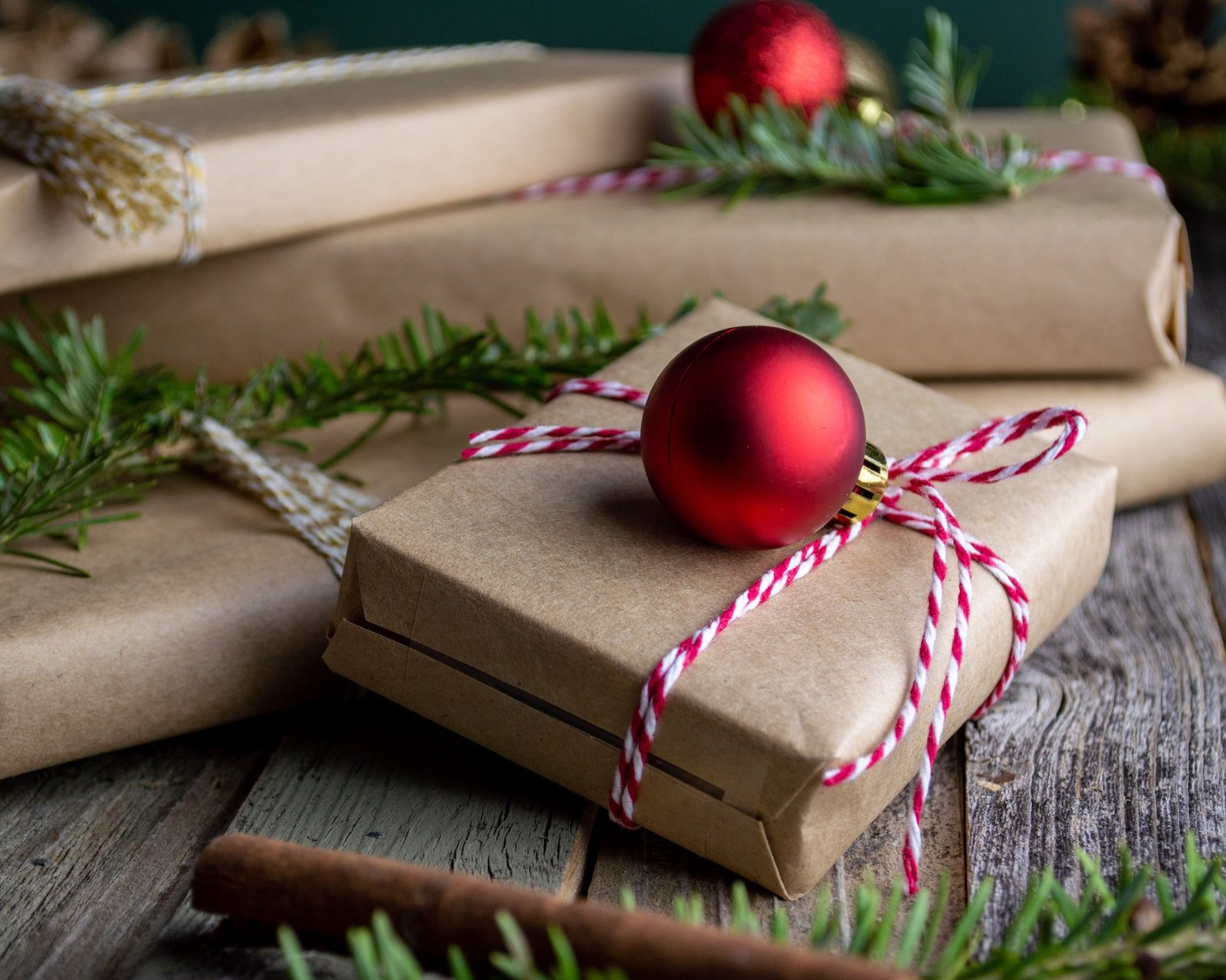 Wrapped Christmas gifts with festive ribbons and decorations