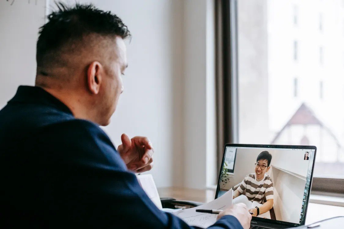 Remote worker talking with a colleague on a video call