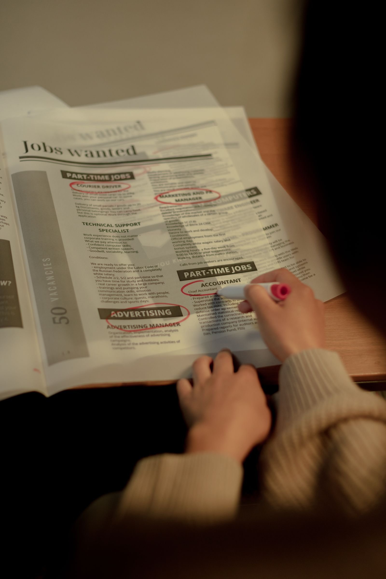 Employer reading a jobs wanted page to understand how candidates browse adverts
