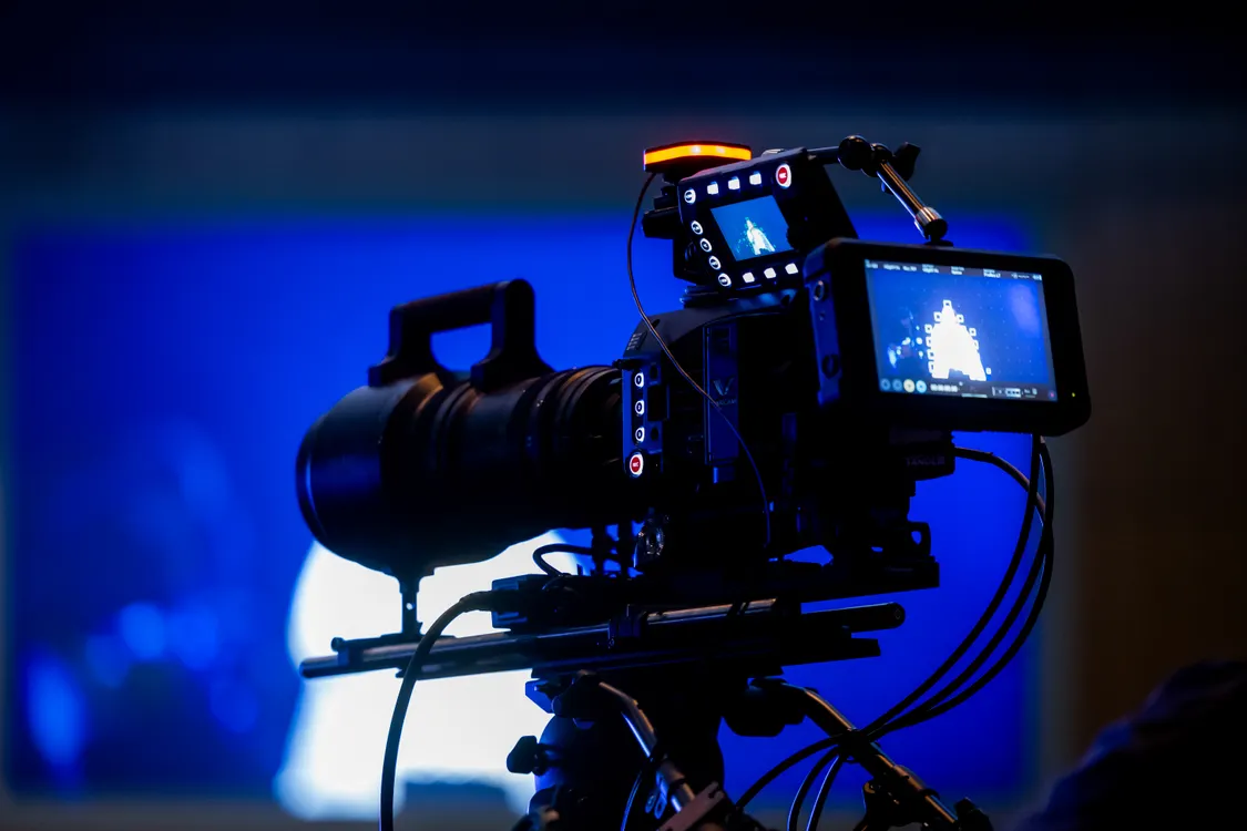 Professional video camera setup inside a television studio