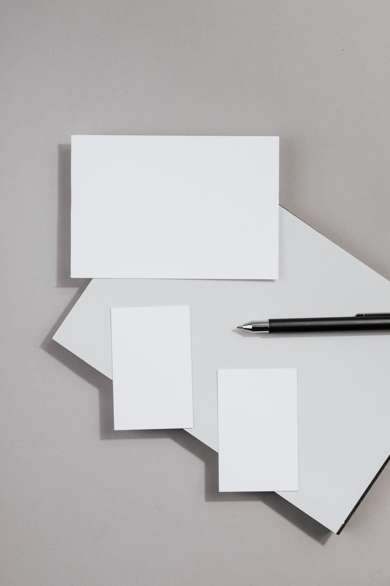 Business cards with a pen for taking notes