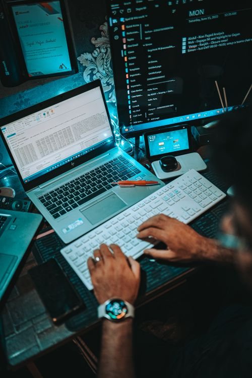 Dual monitor workstation setup in a modern office