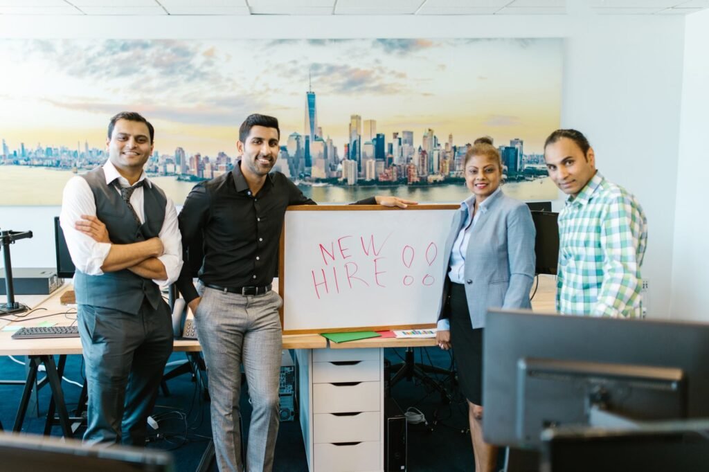 Manager welcoming a new hire during onboarding at a small business