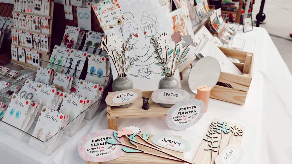 Colourful stall selling handmade goods at an outdoor market