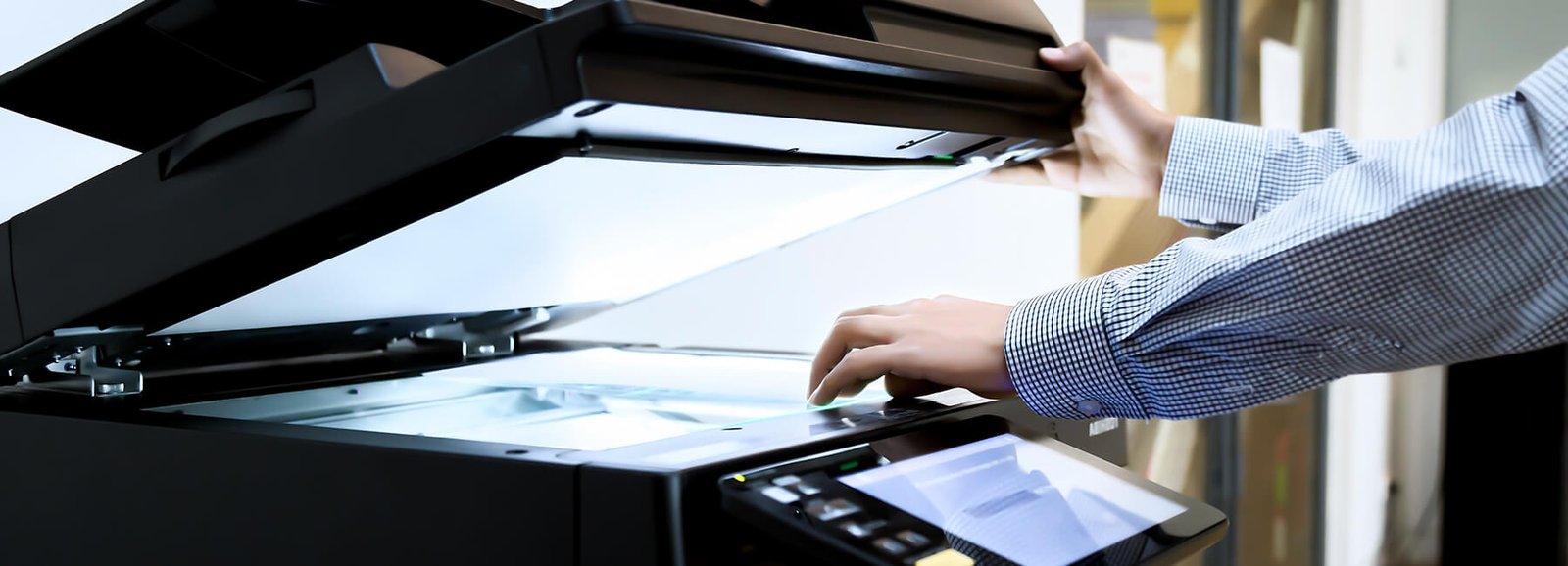Business documents being scanned to create digital copies for a paperless office